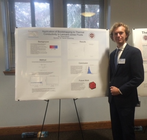 A bright pink sheet of paper used to wrap flowers curves in front of rich blue background